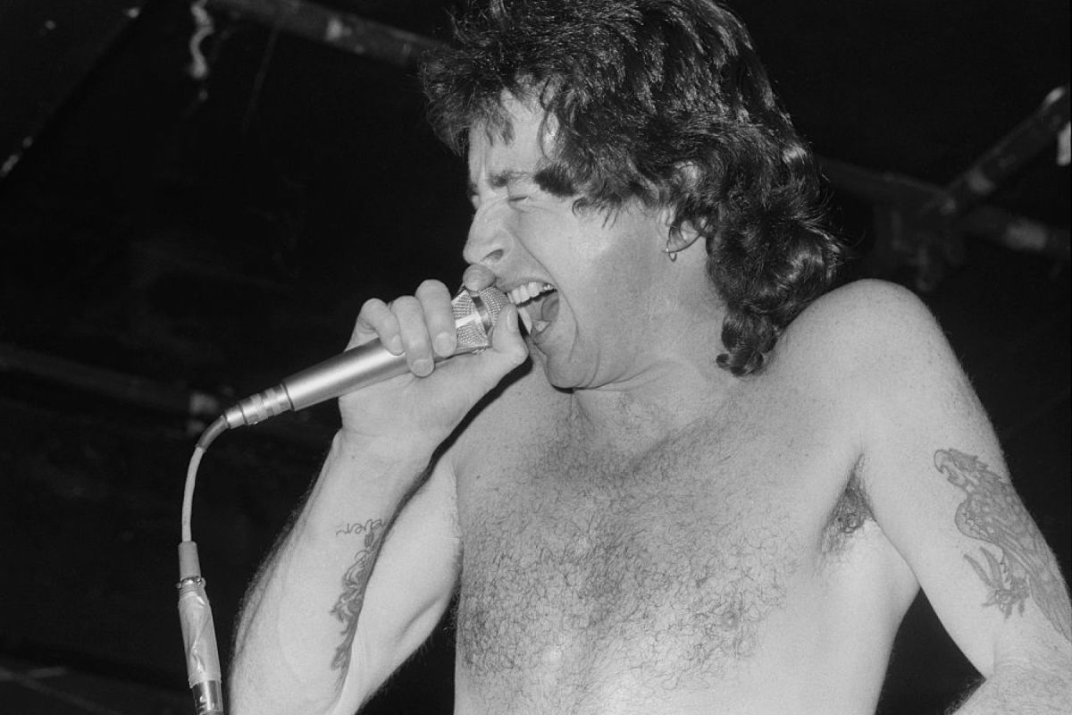 ROLLING STONE: Angus Young, Judas Priest Remember Bon Scott on What Would Have Been AC/DC Singer’s 75th Birthday