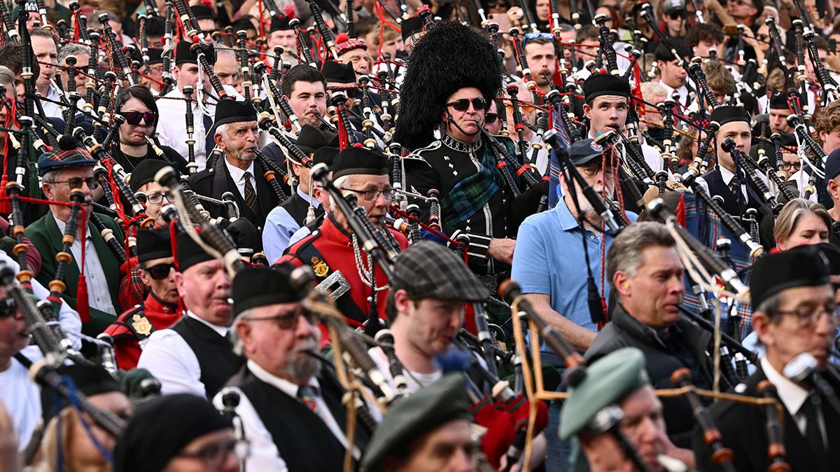 PLANET ROCK: Watch 374 bagpipers in Melbourne smash world record playing AC/DC classic